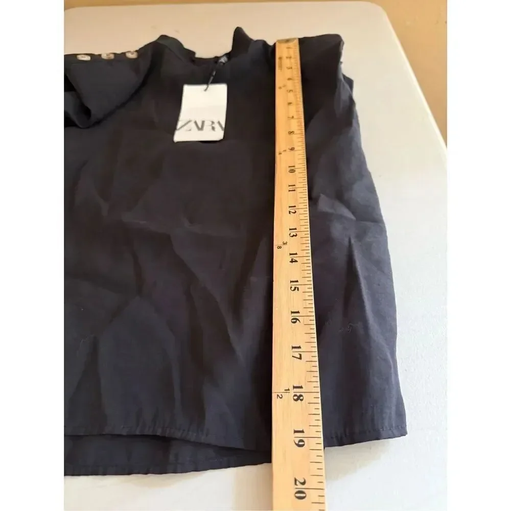 NWT Zara black, sleeveless mock-neck top with button details on the shoulders SZ